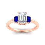 Load image into Gallery viewer, 0.25-ct-emerald-cut-three-stone-sapphire-engagement-ring-in-rose-gold-fdenr9299emgsablangle5-0.25ct-nl-rg.jpg