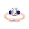 Load image into Gallery viewer, 0.25-ct-emerald-cut-three-stone-sapphire-engagement-ring-in-rose-gold-fdenr9299emgsablangle5-0.25ct-nl-rg.jpg
