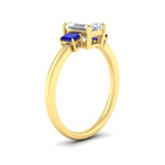 Load image into Gallery viewer, 0.25-ct-emerald-cut-three-stone-sapphire-engagement-ring-in-yellow-gold-fdenr9299emgsablangle2-0.25ct-nl-yg.jpg
