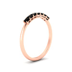 Load image into Gallery viewer, https://cdn.fascinatingdiamonds.com/FDWB179/0.50-carat-Princess-cut-7-stone-black-diamond-wedding-band-in-rose-gold-fdwb179prgblackangle2-0.50ct-nl-rg.jpg