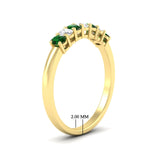 Load image into Gallery viewer, 0.50-ct-oval-seven-stone-emerald-anniversary-band-in-yellow-gold-fdwb8008ovgemgrangle2-0.50ct-nl-yg-hw.jpg