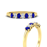 Load image into Gallery viewer, 0.50-ct-oval-seven-stone-sapphire-anniversary-band-in-yellow-gold-fdwb8008ovgsablangle3-0.50ct-nl-yg.jpg