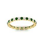 Load image into Gallery viewer, 0.75-carat-round-cut-bezel-set-diamond-and-emerald-eternity-wedding-band-in-yellow-gold-FD8072ROBGEMGRANGLE5-0.72CT-NL-YG?v=1774347027