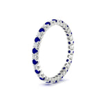 Load image into Gallery viewer, 0.75-carat-round-cut-bezel-set-diamond-and-sapphire-eternity-wedding-band-in-white-gold-FD8072ROBGSABLANGLE2-0.72CT-NL-WG?v=1774347027