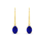 Load image into Gallery viewer, 1-carat-leverback-oval-drop-dangle-sapphire-earrings-in-yellow-gold-fdear11236ovgsablangle2-1.00ct-nl-yg.jpg?v=1765455492