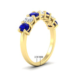 Load image into Gallery viewer, 1.50-carat-seven-stone-oval-sapphire-anniversary-band-in-yellow-gold-fdwb8008ovgsablangle2-1.50ct-nl-yg-hw