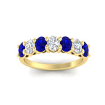 Load image into Gallery viewer, 1.50-carat-seven-stone-oval-sapphire-anniversary-band-in-yellow-gold-fdwb8008ovgsablangle5-1.50ct-nl-yg