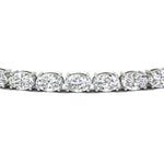 Load image into Gallery viewer, 10-ct-oval-diamond-basket-tennis-bracelet-in-white-gold-fdbrc10444angle2-10.00-ct-nl-wg