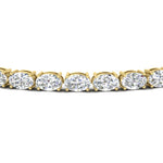 Load image into Gallery viewer, 10-ct-oval-diamond-basket-tennis-bracelet-in-yellow-gold-fdbrc10444angle2-10.00-ct-nl-yg