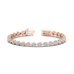 Load image into Gallery viewer, 10-carat-pear-shape-east-west-diamond-tennis-bracelet-in-rose-gold-FDBRC11577-nl-rg.jpg?v=1776415128