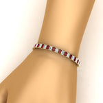 Load image into Gallery viewer, 14-ct-emerald-cut-ruby-tennis-diamond-bracelet-in-yellow-gold-FDBRC10449EMGRUDRHAND-14.00CT-NL-YG.jpg