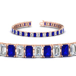 Load image into Gallery viewer, 14-ct-emerald-cut-sapphire-tennis-diamond-bracelet-in-rose-gold-FDBRC10449EMGSABLANGLE2-14.00CT-NL-RG.jpg