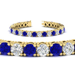 Load image into Gallery viewer, 15-ct.exclusive-diamond-tennis-bracelet-with-sapphire-in-yellow-gold-FDBRC8635ROGSABLANGLE2-15.00_20CT-NL-YG