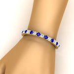 Load image into Gallery viewer, 15-ct.exclusive-diamond-tennis-bracelet-with-sapphire-in-yellow-gold-FDBRC8635ROGSABLHAND-15.00_20CT-NL-YG