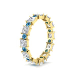 Load image into Gallery viewer, 2.50-carat-art-deco-princess-diamond-eternity-band-with-blue-topaz-in-yellow-gold-fdewb10256prgicbltoangle2-3.00mm-nl-yg