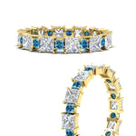 Load image into Gallery viewer, 2.50-carat-art-deco-princess-diamond-eternity-band-with-blue-topaz-in-yellow-gold-fdewb10256prgicbltoangle3-3.00mm-nl-yg