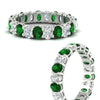 Load image into Gallery viewer, 3-carat-oval-diamond-full-eternity-band-with-emerald-in-white-gold-fdewb8324ovgemgrangle3-4.00x3.00mm-nl-wg