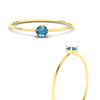 Load image into Gallery viewer, 3-prong-round-blue-topaz-tiny-band-ring-in-yellow-gold-fd9389gicbltoangle3-nl-yg.jpg?v=1756441995