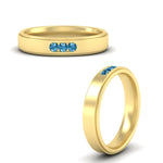 Load image into Gallery viewer, 3-stone-round-ice-blue-topaz-channel-set-mens-wedding-ring-in-yellow-gold-fdm10340rogicbltoangle3-nl-yg