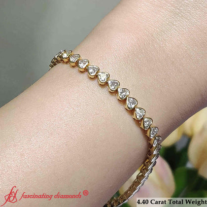4-40-ct-heart-shaped-diamond-bezel-tennis-bracelet-in-yellow-gold-fdbrc10581ht-1_1