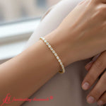 Load image into Gallery viewer, 4-ct-emerald-cut-bezel-tennis-diamond-bracelet-in-yellow-gold-render-fdbrc10583-4-00-ct