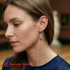 Load image into Gallery viewer, 4-ct-emerald-cut-diamond-drop-earrings-in-white-gold-fdear11236em-model