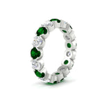 Load image into Gallery viewer, 4.25-carat-round-diamond-and-emerald-bezel-droplet-wedding-band-in-white-gold-FD8072ROBGEMGRANGLE2-4.25CT-NL-WG?v=1751956670