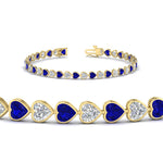 Load image into Gallery viewer, 7-60-ct-bezel-tennis-bracelet-heart-shaped-diamond-with-sapphire-in-yellow-gold-fdbrc10581htgsablangle2-7-60-ct-nl-yg