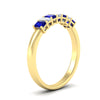 Load image into Gallery viewer, 7-stone-emerald-cut-sapphire-wedding-band-in-yellow-gold-fdwb8008emgsablangle2-0.70ct-nl-yg?v=1773988649