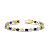 Load image into Gallery viewer, 7.68-carat-classic-teardrop-link-east-west-sapphire-bracelet-in-yellow-gold-FDBRCPE10581GSABL-7.68CT-NL-YG.jpg?v=1776852362