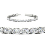 Load image into Gallery viewer, basket-tennis-bracelet-14-carat-oval-shaped-in-white-gold-fdbrc10444angle2-14.00ct-nl-wg