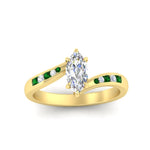 Load image into Gallery viewer, Marquise-cut-diamond-swirl-channel-set-emerald-wedding-ring-in-yellow-gold-FDENS4028MQRGEMGRANGLE5-NL-YG_9d801cf1-261c-4515-8003-9ff02fb3693c.jpg?v=1754996097