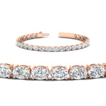 Load image into Gallery viewer, oval-shaped-13-carat-basket-tennis-bracelet-in-rose-gold-fdbrc10444angle2-13.00-ct-nl-rg