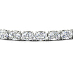 Load image into Gallery viewer, oval-shaped-13-carat-basket-tennis-bracelet-in-white-gold-fdbrc10444angle2-13.00-ct-nl-wg