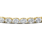 Load image into Gallery viewer, oval-shaped-13-carat-basket-tennis-bracelet-in-yellow-gold-fdbrc10444angle2-13.00-ct-nl-yg