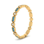 Load image into Gallery viewer, art-deco-thin-stacking-diamond-eternity-band-with-blue-topaz-in-yellow-gold-FDEWB2139GICBLTOANGLE3-NL-YG.jpg