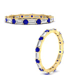 Load image into Gallery viewer, baguette-and-round-diamond-band-with-blue-sapphire-in-yellow-gold-fdewb318gsablangle3-nl-yg