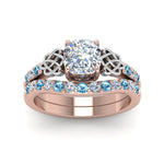Load image into Gallery viewer, celtic-cushion-cut-diamond-wedding-ring-set-with-blue-topaz-in-rose-gold-FDENS2255B1CUGICBLTOANGLE5-NL-RG_810b85a8-b0d0-47e0-88e9-d7b33d8c104d?v=1757065024