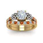 Load image into Gallery viewer, celtic-cushion-cut-diamond-wedding-ring-set-with-orange-sapphire-in-yellow-gold-FDENS2255B1CUGSAORANGLE5-NL-YG_d7924e76-44ec-4d68-a3a6-0aa42ab3adcf?v=1757065044