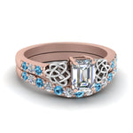 Load image into Gallery viewer, celtic-emerald-cut-diamond-wedding-ring-set-with-blue-topaz-in-rose-gold-FDENS2255B1EMGICBLTO-NL-RG_ed039ddc-2133-47f6-8ae8-9904777fb448?v=1757056978