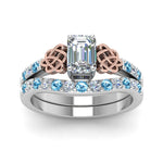 Load image into Gallery viewer, celtic-emerald-cut-diamond-wedding-ring-set-with-blue-topaz-in-white-gold-FDENS2255B1EMGICBLTOANGLE5-NL-WG_f17859a7-321d-435d-8a01-1bc914c35295?v=1757056978