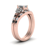 Load image into Gallery viewer, celtic-emerald-cut-wedding-ring-set-with-black-diamond-in-rose-gold-FDENS2255B1EMGBLACKANGLE2-NL-RG_9cf4fcc5-0306-4ac3-ade5-a1549cf4bac3?v=1757056978