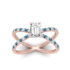 Load image into Gallery viewer, cross-band-emerald-cut-engagment-ring-with-blue-topaz-rose-gold-FD9890EMRGICBLTOANGLE5-NL-RG_52984a76-2eb8-4672-9443-c8c104102e18.jpg?v=1760525879