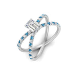 Load image into Gallery viewer, cross-band-emerald-cut-engagment-ring-with-blue-topaz-white-gold-FD9890EMRGICBLTOANGLE2-NL-WG_274cb56f-dcd9-44b6-9fa2-1289e6853d6a.jpg?v=1760525880