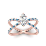 Load image into Gallery viewer, cross-band-marquise-cut-engagment-ring-with-blue-topaz-rose-gold-FD9890MQRGICBLTOANGLE5-NL-RG_aa00ad6e-6487-4323-a00b-ea1a3964635d.jpg?v=1760525899
