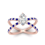 Load image into Gallery viewer, cross-band-marquise-cut-engagment-ring-with-sapphire-rose-gold-FD9890MQRGSABLANGLE5-NL-RG_022f3f8b-2f32-4e6c-8d62-2e31894a78d0.jpg?v=1760525898