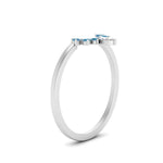 Load image into Gallery viewer, curved-crown-blue-topaz-wedding-band-in-white-gold-FD1046BGICBLTOANGLE2-NL-WG.jpg?v=1766983852