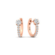 diamond-pavé-huggie-hoops-in-rose-gold-fdear11705angle1-nl-rg