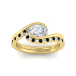 Load image into Gallery viewer, east-west-oval-black-diamond-wedding-band-ring-set-in-yellow-gold-fdens7806ovgblackangle5-nl-yg_b170482c-fbc8-45e0-aa47-bdfe29cef8bc.jpg?v=1759992100