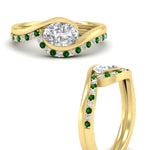 Load image into Gallery viewer, east-west-oval-emerald-wedding-band-ring-set-in-yellow-gold-fdens7806ovgemgrangle3-nl-yg.jpg?v=1759991829